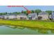 A home at 1689 Eider Down Dr has a fenced backyard by a pond at 1689 Eider Down Dr, Summerville, SC 29483