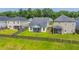 A well-maintained backyard features a screened porch and wooden fence at 1689 Eider Down Dr, Summerville, SC 29483