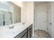 Bright bathroom featuring a double vanity with a large mirror and tile flooring and access to shower at 1689 Eider Down Dr, Summerville, SC 29483