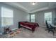 Comfortable bedroom with two windows and neutral carpeting offering plenty of natural light at 1689 Eider Down Dr, Summerville, SC 29483