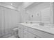 Bright bathroom featuring a double sink, a vanity, and a shower with a curtain at 1832 Agate Bay Dr, Mount Pleasant, SC 29466