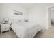 Bright bedroom featuring light decor, carpet floors, and adjacent bathroom access at 1832 Agate Bay Dr, Mount Pleasant, SC 29466