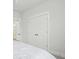 Spacious bedroom featuring white closet doors and adjacent bathroom access at 1832 Agate Bay Dr, Mount Pleasant, SC 29466