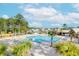 Resort-style community pool with ample seating, shaded areas, and lush landscaping at 1832 Agate Bay Dr, Mount Pleasant, SC 29466