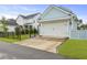 Charming home with a well-manicured lawn, complemented by black fencing for added privacy and curb appeal at 1832 Agate Bay Dr, Mount Pleasant, SC 29466