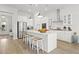 Spacious kitchen featuring stainless steel appliances, a large island with seating, and modern pendant lighting at 1832 Agate Bay Dr, Mount Pleasant, SC 29466