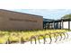 Modern community library, Wando Mount Pleasant Library, featuring lots of parking, sidewalks and covered entry at 1832 Agate Bay Dr, Mount Pleasant, SC 29466