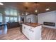 Open-concept kitchen with wood-topped island, modern appliances, and seamless flow into the living area at 1917 Piper Dr, Charleston, SC 29407