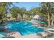 Beautiful community pool area with ample seating and resort-like amenities at 1928 Mossdale Dr, Johns Island, SC 29455
