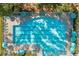 Aerial view of the expansive community swimming pool with lounge chairs at 1928 Mossdale Dr, Johns Island, SC 29455