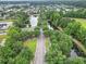 Community aerial view with tree lined streets and ponds at 205 White Gables Dr, Summerville, SC 29483