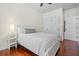 Comfortable bedroom featuring hardwood floors, crisp white walls, and a ceiling fan at 205 White Gables Dr, Summerville, SC 29483