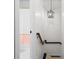 A hallway with staircase and a view into a bathroom at 205 White Gables Dr, Summerville, SC 29483