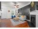 Charming living room featuring a fireplace, ceiling fan, and comfortable seating at 205 White Gables Dr, Summerville, SC 29483