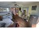 Bedroom featuring light blue walls and hardwood floors at 207 Cedar St, Saint George, SC 29477