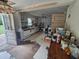 Kitchen area featuring modern appliances, cabinetry, and an exterior door at 207 Cedar St, Saint George, SC 29477