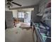 Bright kitchen featuring white appliances, cabinetry, sink and view to eat-in area at 207 Cedar St, Saint George, SC 29477