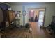 Inviting living room with hardwood floors and view to another living space at 207 Cedar St, Saint George, SC 29477