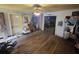 Spacious living room with a ceiling fan and hardwood floors at 207 Cedar St, Saint George, SC 29477