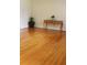 Bright room featuring pristine hardwood flooring and ornate accent table at 2163 Pinehurst Ave, Charleston, SC 29414