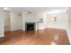 Inviting living room features a cozy fireplace and gleaming hardwood floors at 22 Ogier St, Charleston, SC 29403