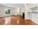 Spacious living room with a large window and beautiful hardwood flooring at 22 Ogier St, Charleston, SC 29403