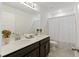Bright bathroom with double vanity, a large mirror, and a shower tub combination at 228 Lucca Dr, Summerville, SC 29486