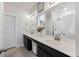 Bright bathroom features a double sink vanity with ample counter space and a glass-enclosed shower at 228 Lucca Dr, Summerville, SC 29486
