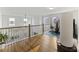 Upstairs flex space setup as an exercise room with a treadmill, elliptical, and views of the neighborhood at 228 Lucca Dr, Summerville, SC 29486