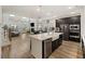 Spacious kitchen with island, stainless appliances, and open floor plan at 228 Lucca Dr, Summerville, SC 29486