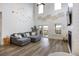 Open-concept living room featuring high ceilings, fireplace, and sliding door to outdoor patio at 228 Lucca Dr, Summerville, SC 29486
