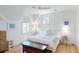 Bright bedroom featuring hardwood floors, light walls and two windows at 2312 Rushland Landing Rd, Johns Island, SC 29455