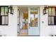 Inviting entryway featuring a stylish door, hardwood floors, and views into the home's living spaces at 2312 Rushland Landing Rd, Johns Island, SC 29455