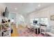 Bright home office featuring hardwood floors, a TV, and modern decor at 2312 Rushland Landing Rd, Johns Island, SC 29455
