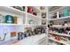 Pantry area features built-in shelves and marble countertops at 2312 Rushland Landing Rd, Johns Island, SC 29455