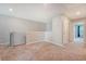 Upstairs hallway featuring neutral walls, carpet, and a railing at 242 Torslanda Ln, Summerville, SC 29486