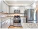 Close-up of kitchen features stainless steel appliances, and granite countertops at 242 Torslanda Ln, Summerville, SC 29486