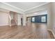 Bright living room boasting hardwood floors, recessed lighting, and an open staircase at 242 Torslanda Ln, Summerville, SC 29486