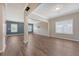 Spacious living room featuring hardwood floors, natural light, and an open-concept design at 242 Torslanda Ln, Summerville, SC 29486