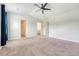 Spacious main bedroom with neutral carpet, ensuite bathroom, and walk-in closet at 242 Torslanda Ln, Summerville, SC 29486