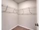 Walk-in closet with wire shelving and neutral colored walls at 242 Torslanda Ln, Summerville, SC 29486