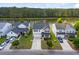Aerial view of a lakeside community with well-maintained homes, landscaping, and water views at 255 Decatur Dr, Summerville, SC 29486