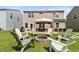 An outdoor firepit with chairs in a spacious backyard at 255 Decatur Dr, Summerville, SC 29486