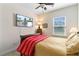 Bedroom featuring a ceiling fan, mounted tv, and window providing lots of natural light at 255 Decatur Dr, Summerville, SC 29486