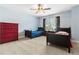 Bedroom showcasing two cozy beds, soft carpet, and a ceiling fan at 255 Decatur Dr, Summerville, SC 29486