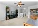Bonus room with neutral carpet and media center featuring storage baskets and open shelving at 255 Decatur Dr, Summerville, SC 29486