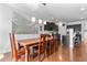 Dining room featuring hardwood floors, pendant lighting, and view into kitchen at 255 Decatur Dr, Summerville, SC 29486