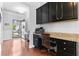 Convenient desk and storage cabinet area located near the entryway at 255 Decatur Dr, Summerville, SC 29486