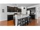 Kitchen with dark cabinets, stainless steel appliances, granite countertops, and bar stool seating at 255 Decatur Dr, Summerville, SC 29486
