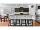 A kitchen featuring dark cabinets, granite countertops, stainless steel appliances, and bar stool seating at 255 Decatur Dr, Summerville, SC 29486